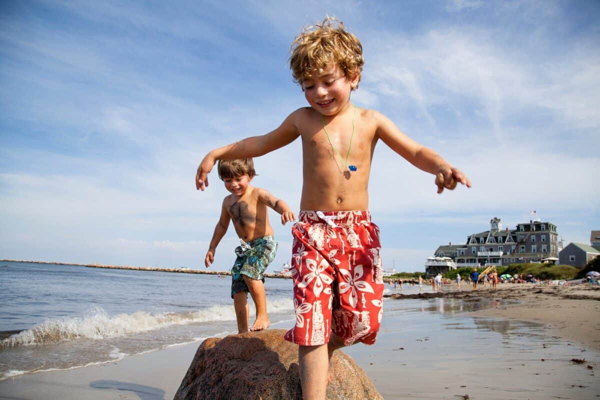 Two boys playing on beach