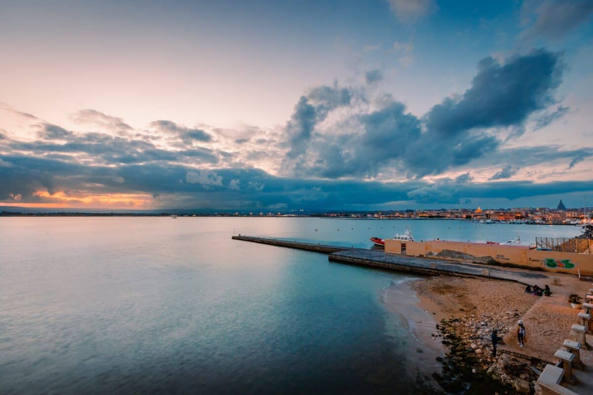 Panoramic view of the Ortigia coastline during sunset
